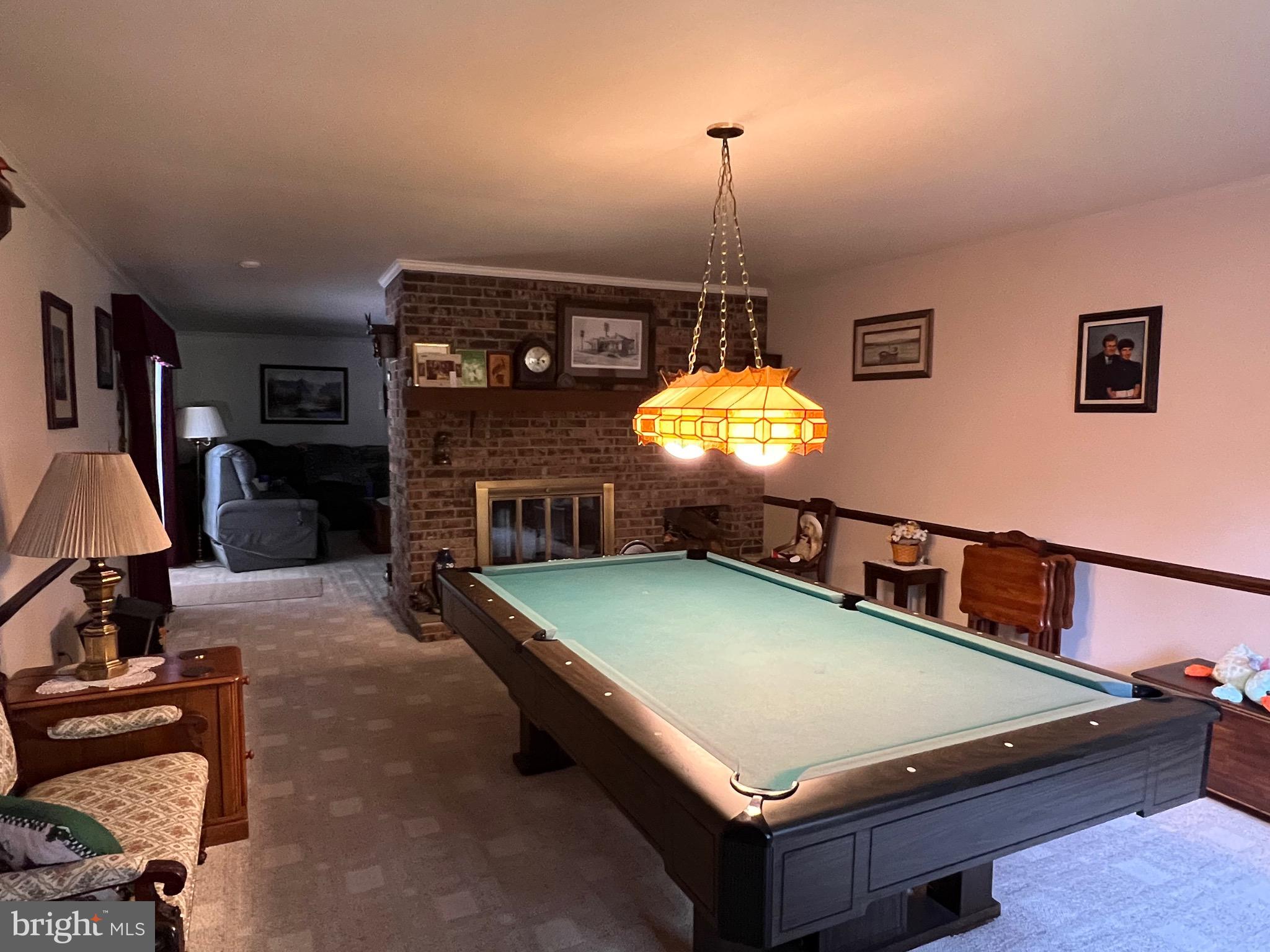324 Miller Road Reading, PA 19608 - Photo 9 of 47 Doubled aided fireplace view from game room