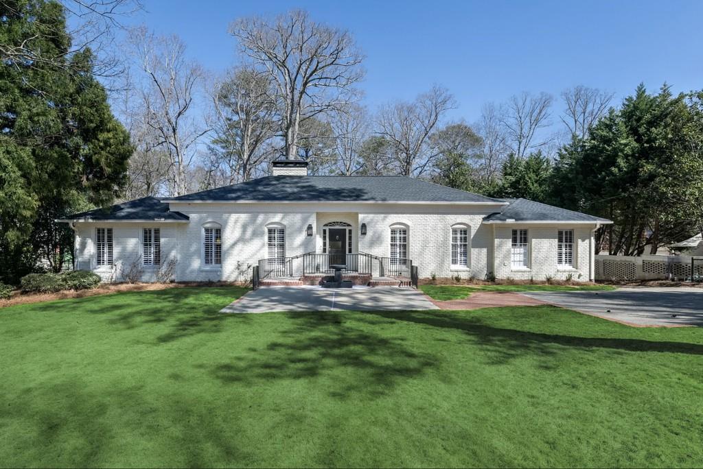 139 West Paces Ferry Road Northwest Atlanta, GA 30305 - Photo 1 of 1 a front view of house with yard barbeque and outdoor seating