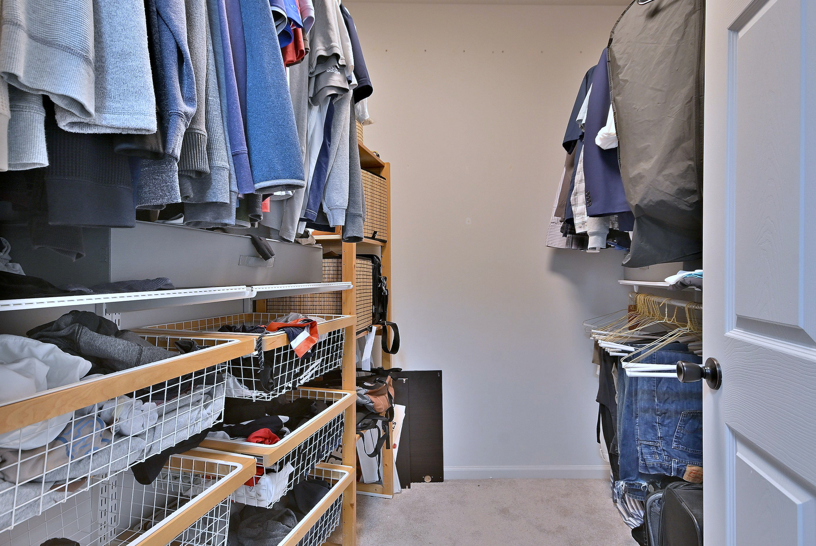 145 South York Street, Unit 404 Elmhurst, IL 60126 - Photo 24 of 28 a view of walk in closet with clothes and shoes