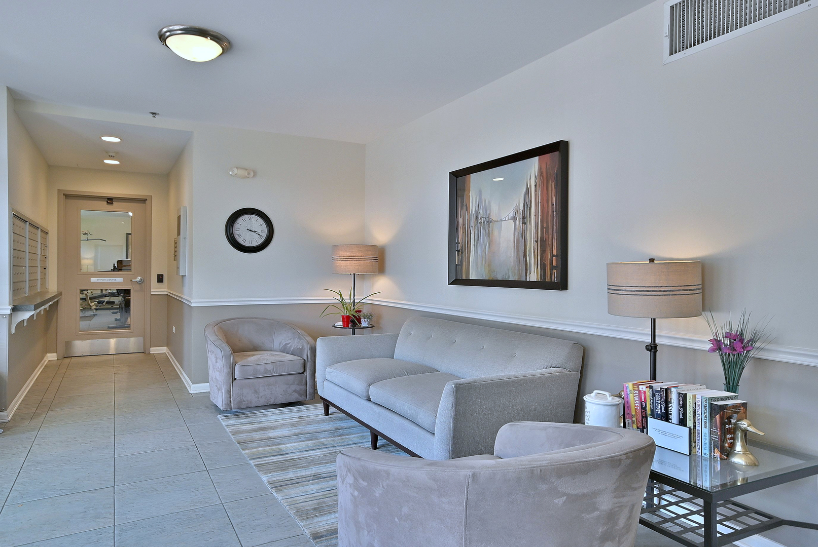 145 South York Street, Unit 404 Elmhurst, IL 60126 - Photo 5 of 28 a living room with furniture and a window