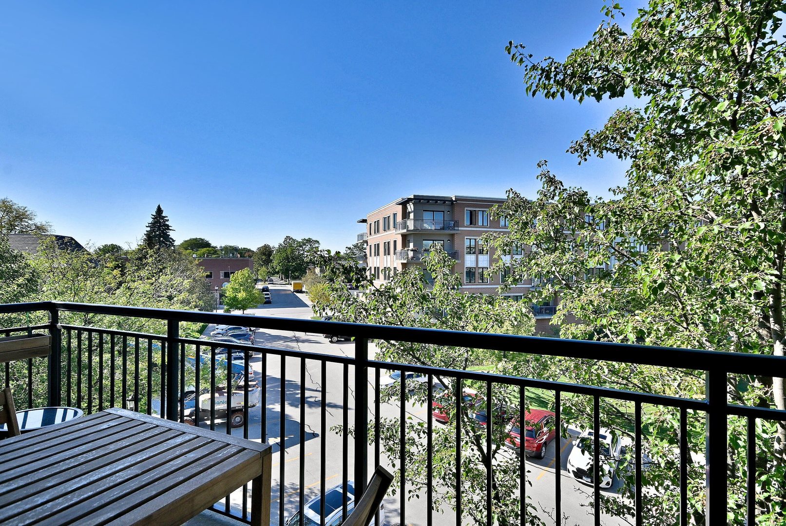 145 South York Street, Unit 404 Elmhurst, IL 60126 - Photo 7 of 28 a view of city from a balcony
