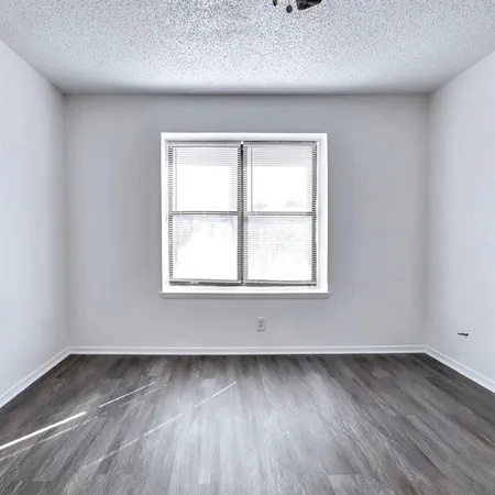 a view of a room with an empty space
