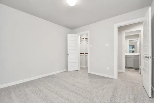 swimming pool view with a seating space