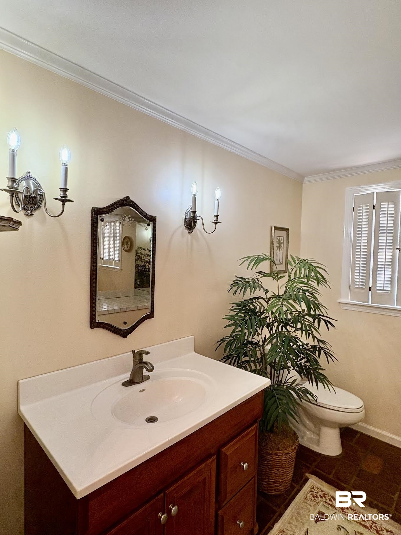 6105 Brandy Run Road South Mobile, AL 36608 - Photo 17 of 45 Bathroom featuring vanity, toilet, crown molding, and baseboards