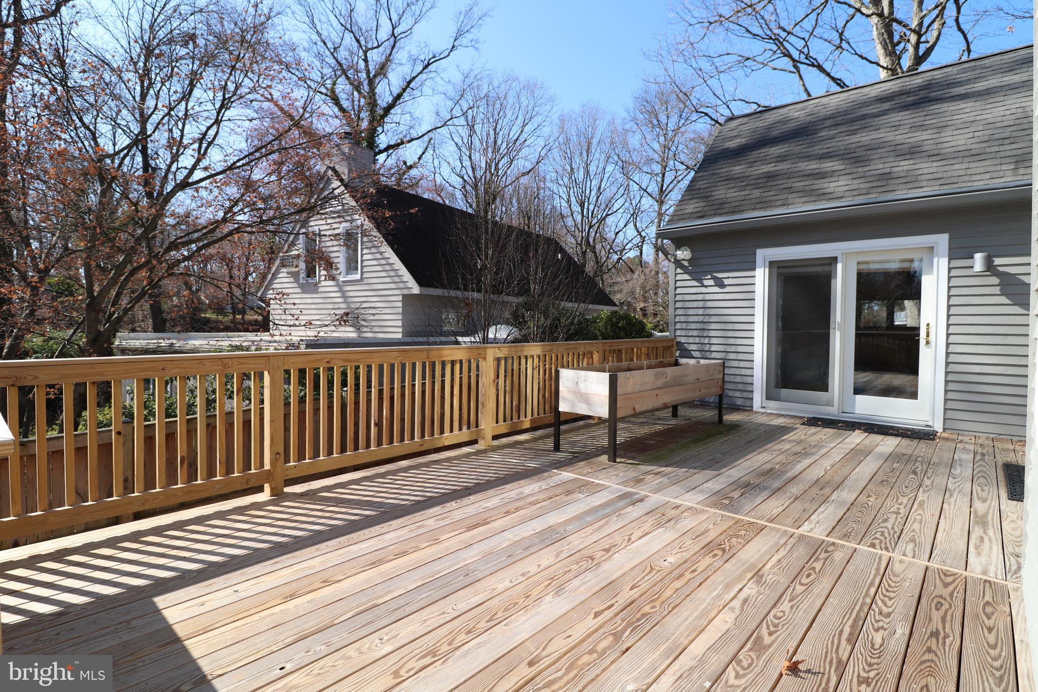 1400 Ritchie Court Annapolis, MD 21401 - Photo 33 of 58 Rear Deck - Dining Room & Primary Bedroom