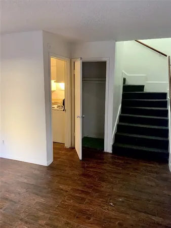 a view of entryway with wooden floor