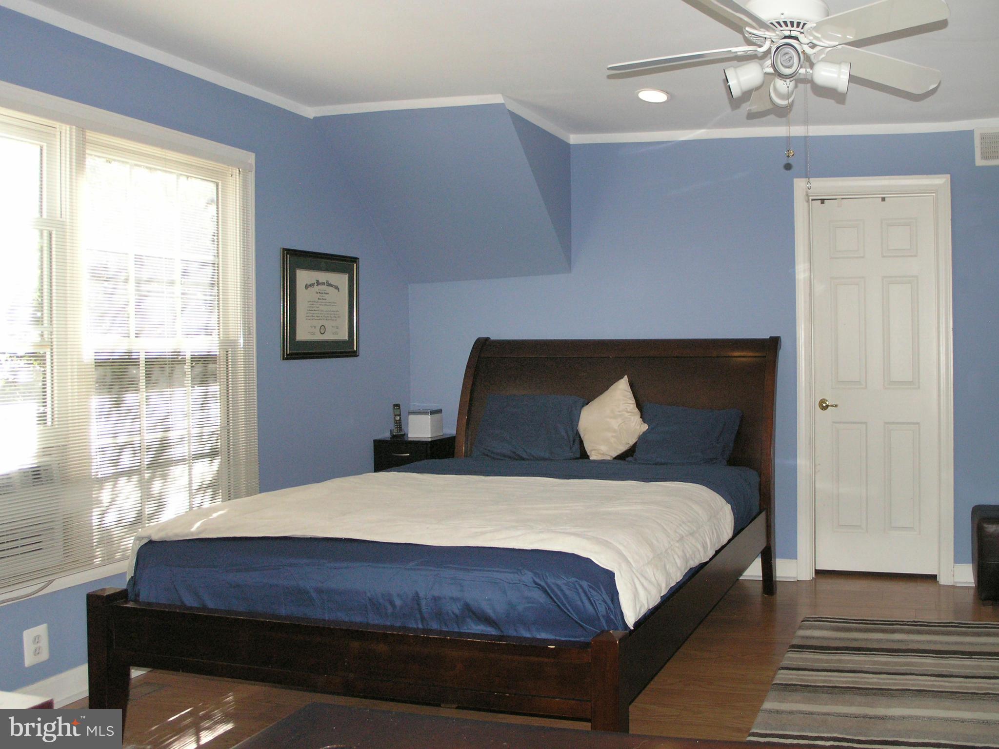 47611 Rhyolite Place Sterling, VA 20165 - Photo 13 of 29 a bedroom with a bed and window