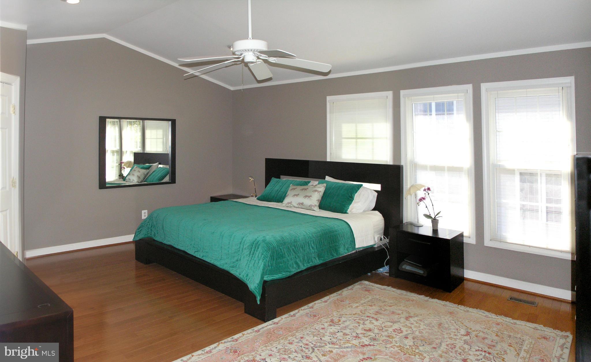 47611 Rhyolite Place Sterling, VA 20165 - Photo 22 of 29 a bedroom with a bed and a window
