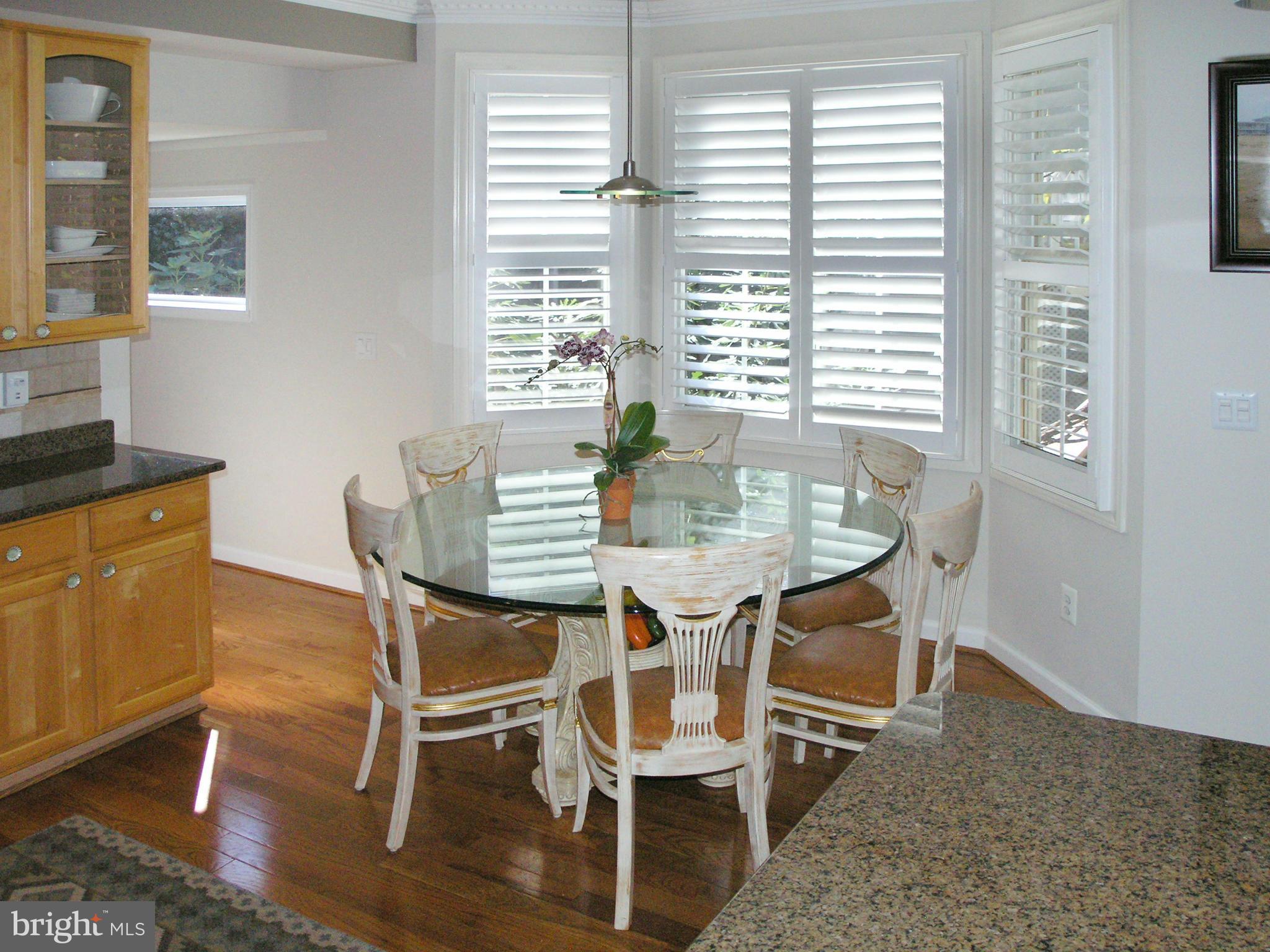 47611 Rhyolite Place Sterling, VA 20165 - Photo 9 of 29 a view of a dining room with furniture and windows