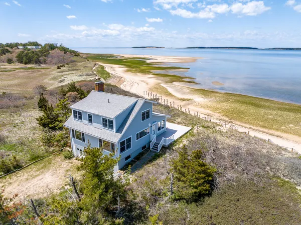 a view of a house with a ocean view