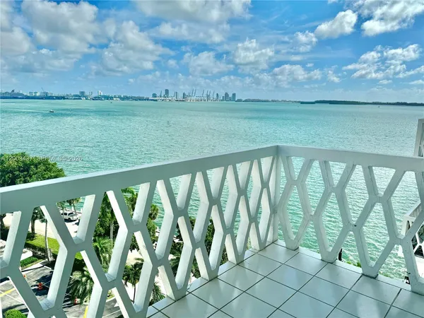 a balcony with outdoor view