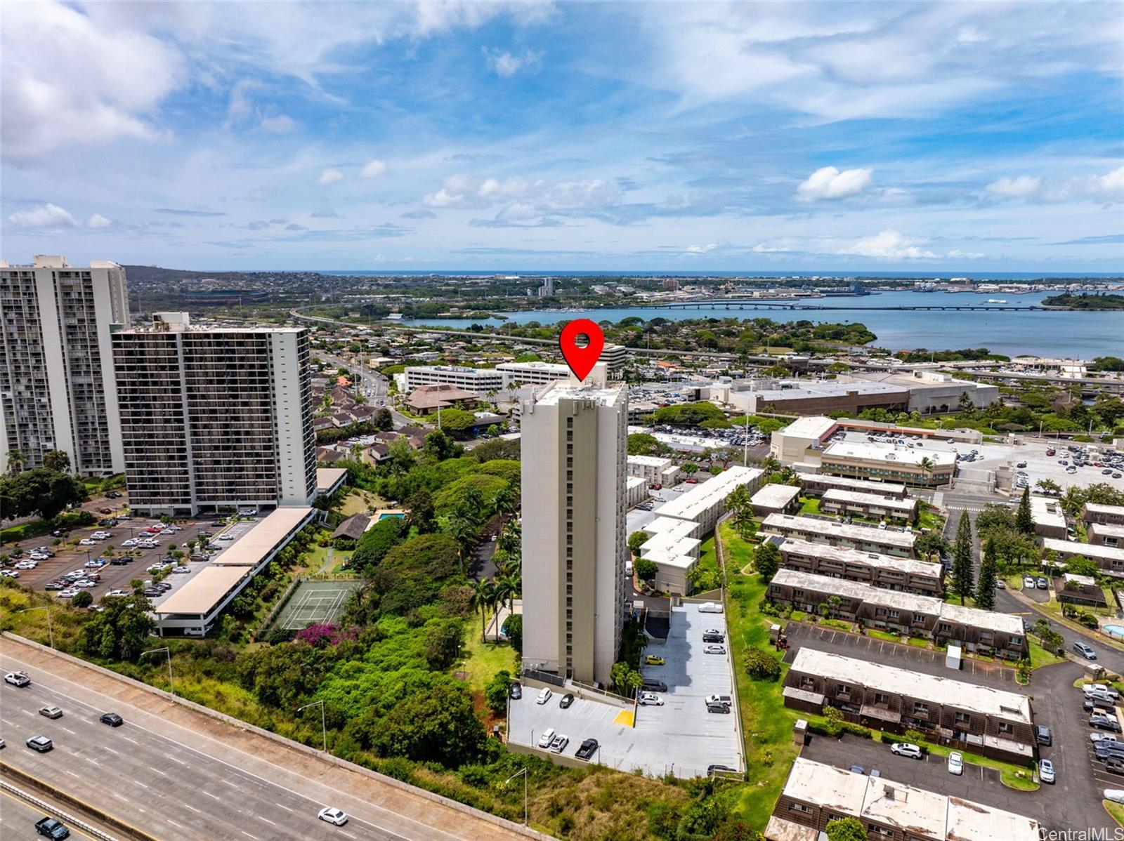 98-1038 Moanalua Road, Unit 1502 Aiea, HI 96701 - Photo 2 of 20 a view of a city with tall buildings