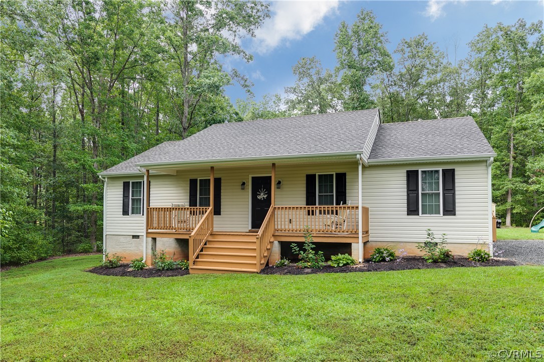 473 Winding Ridge Way Bumpass, VA 23024 - Photo 1 of 25 a view of a house with a backyard