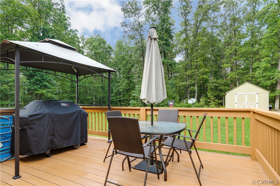 473 Winding Ridge Way Bumpass, VA 23024 - Photo 24 of 25 a view of backyard with outdoor seating and plants