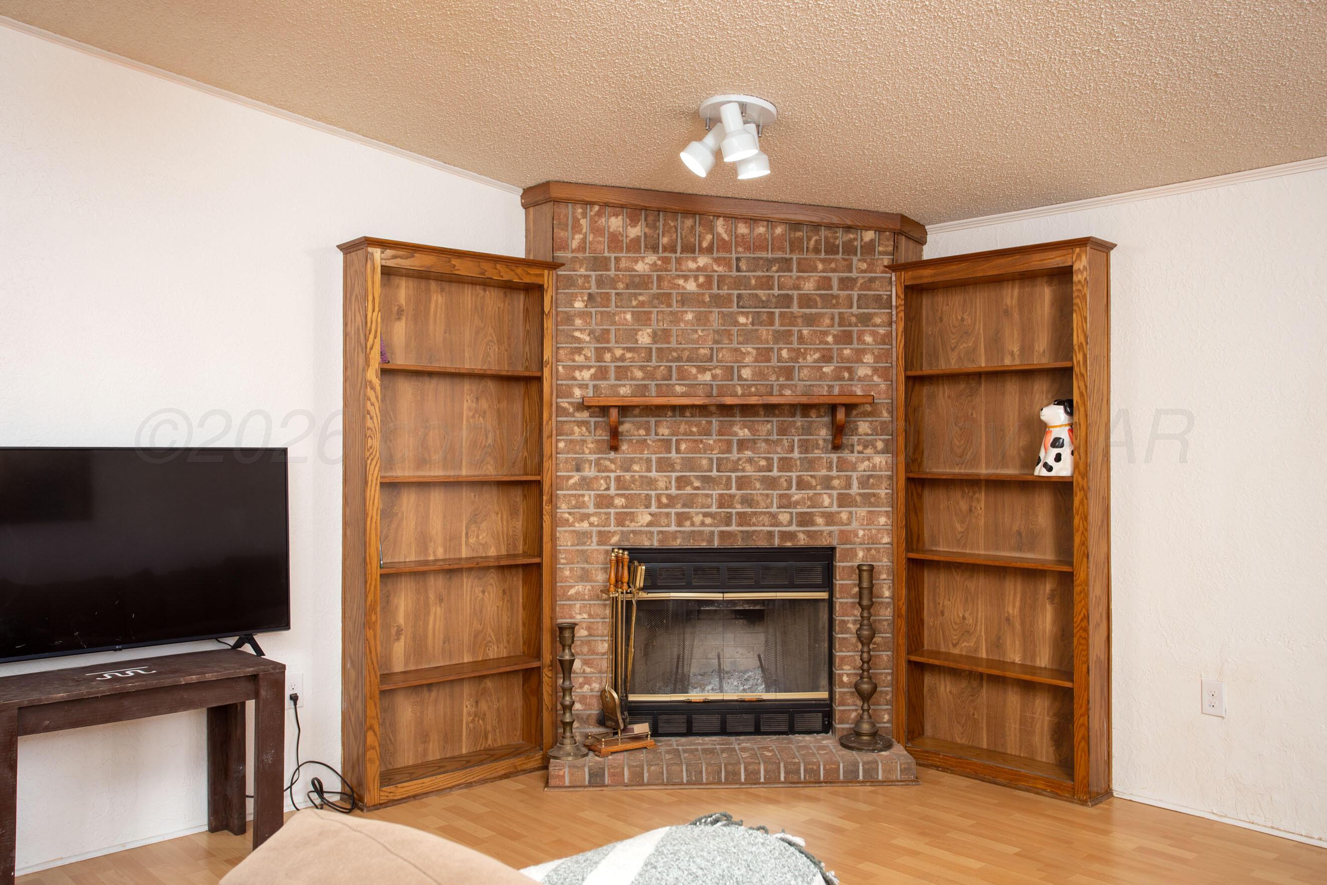 8300 Arlie Road Amarillo, TX 79108 - Photo 5 of 44 8300 Arlie - Corner Fireplace