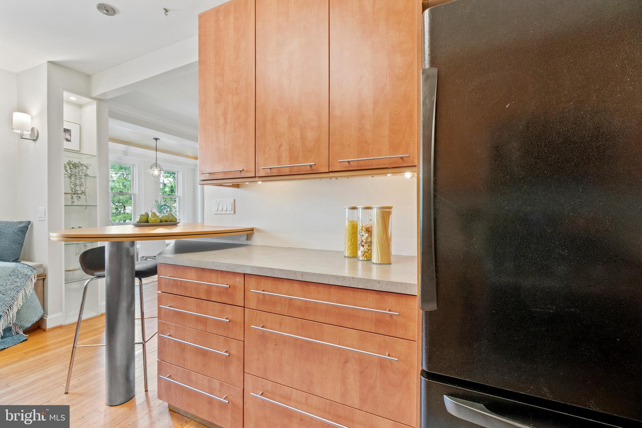 3601 Connecticut Avenue Northwest, Unit 106 Washington, DC 20008 - Photo 13 of 34 a kitchen with a sink and a window