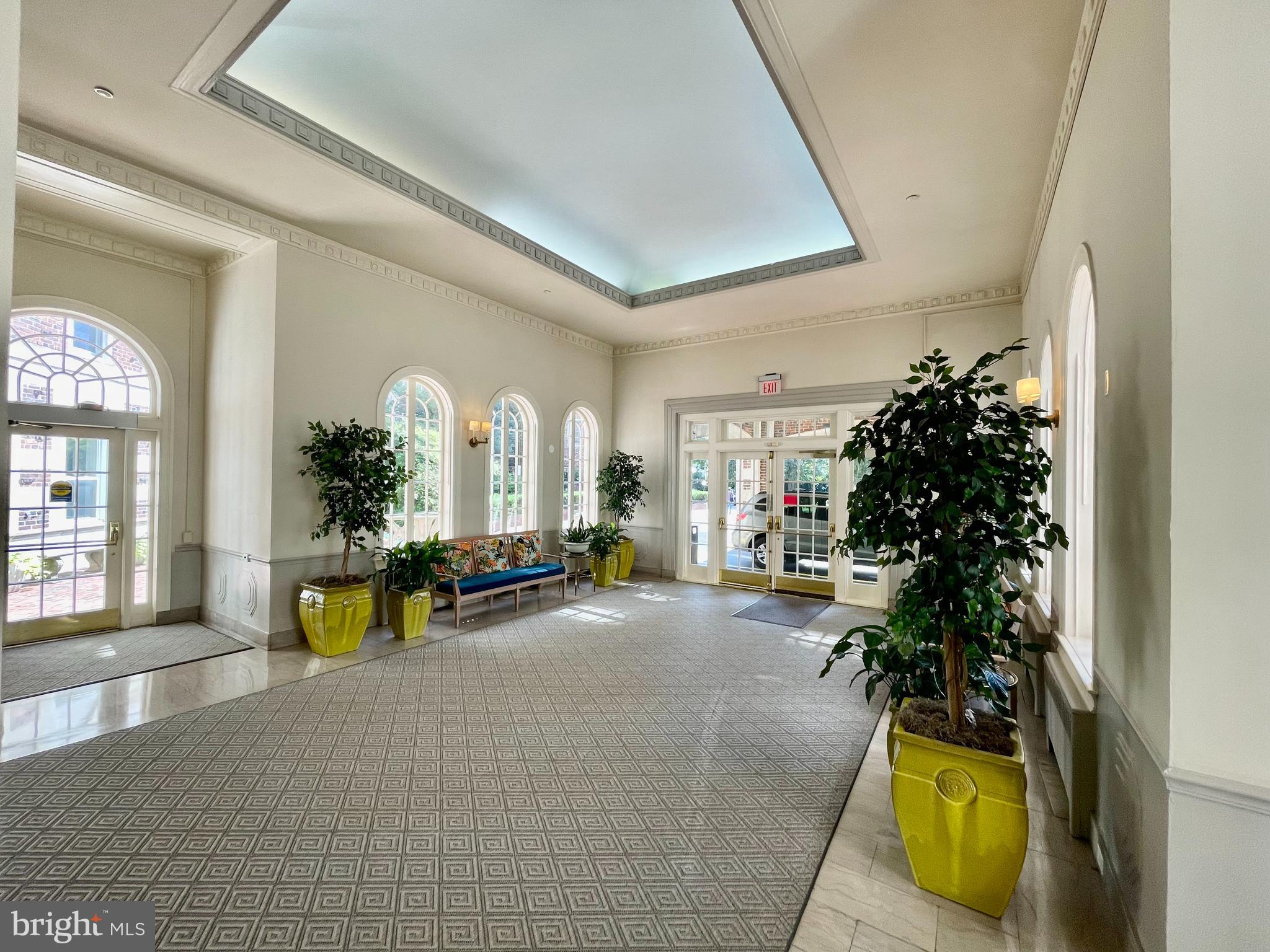 3601 Connecticut Avenue Northwest, Unit 106 Washington, DC 20008 - Photo 28 of 34 a living room with furniture and a potted plant