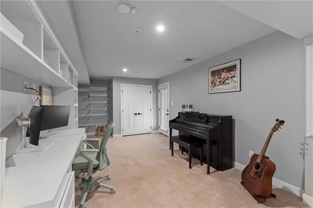 a room with furniture and a flat screen tv