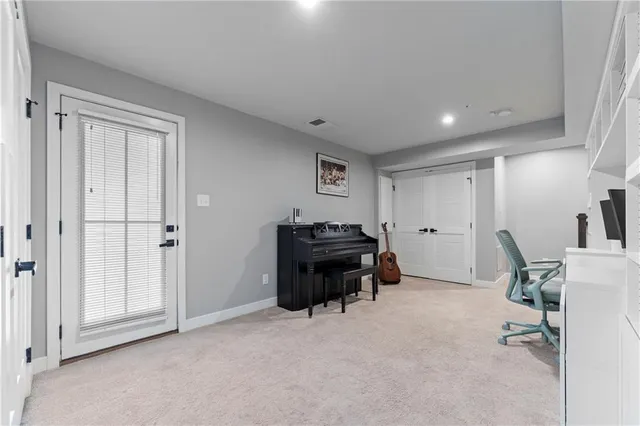 a room that has a bed and a chair in it