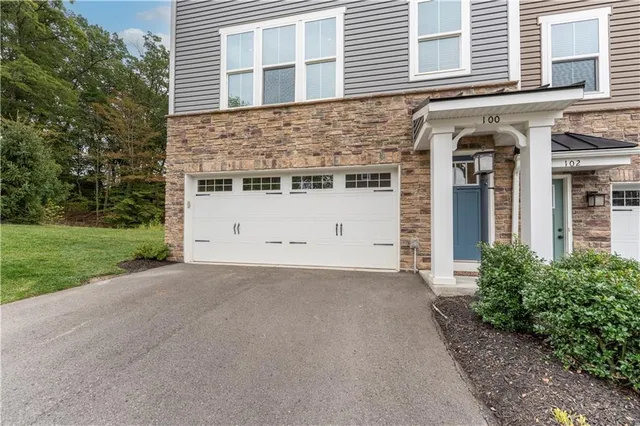 a patio with wooden floors and patio