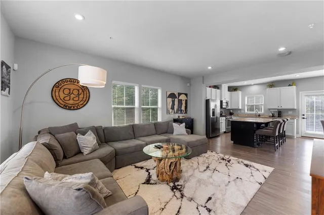 a living room with furniture and a table