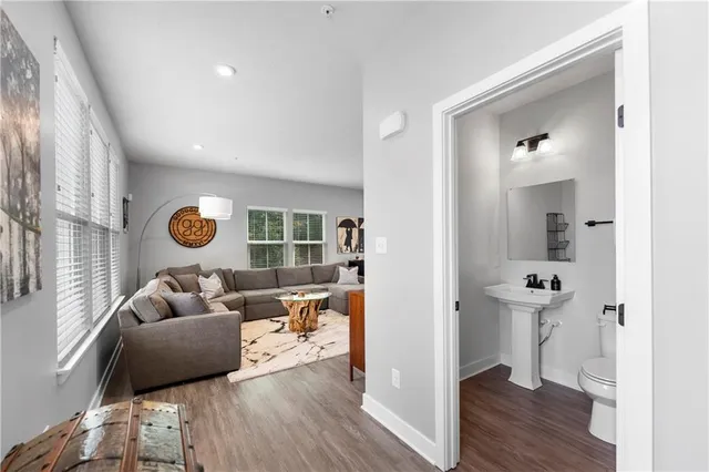 a living room with furniture and a window