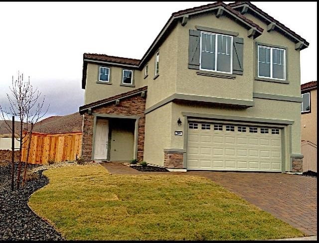 2985 Show Jumper Lane Reno, NV 89521 - Photo 1 of 1 a front view of a house with a yard