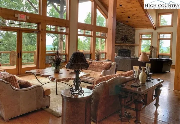 a kitchen with stainless steel appliances granite countertop a stove a sink dishwasher and a refrigerator