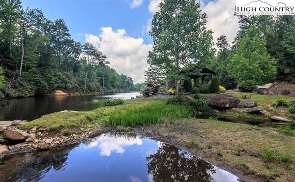 a view of a lake with a park