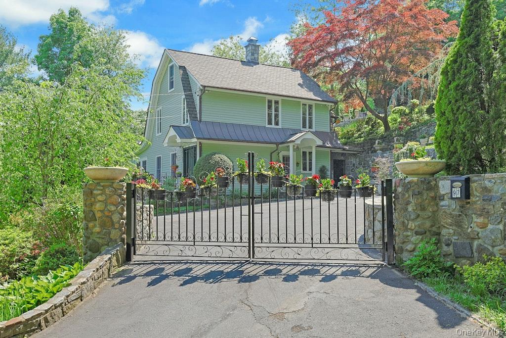 97 Underhill Road Scarsdale, NY 10583 - Photo 39 of 39 a view of a wrought iron fences in front of house