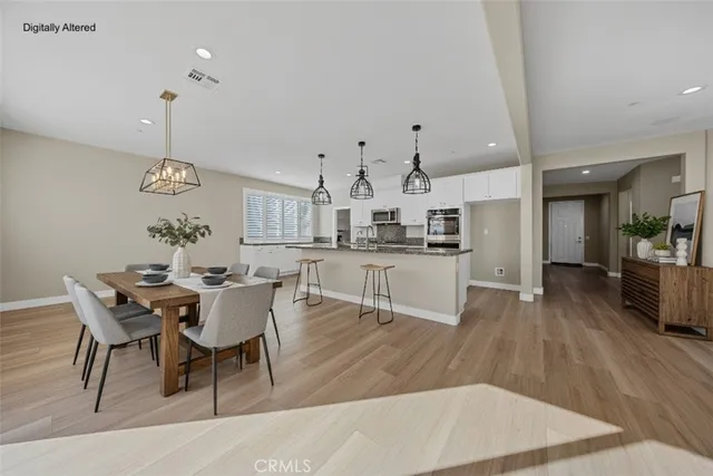 a view of a dining room kitchen and a window