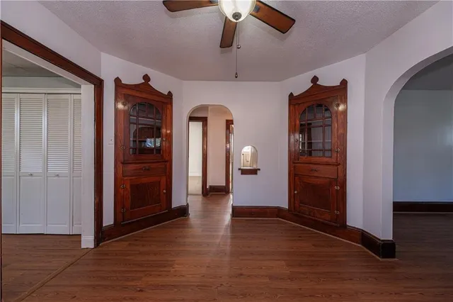 a view of empty room and wooden floor