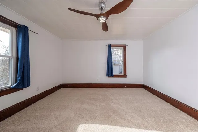 a view of a room with a window