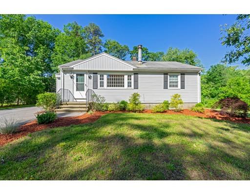 97 Meadowbrook Road Chelmsford, MA 01863 - Photo 1 of 15 a front view of a house with a yard