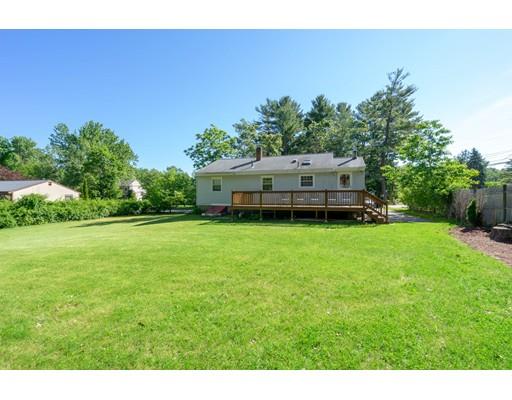 97 Meadowbrook Road Chelmsford, MA 01863 - Photo 15 of 15 a backyard of a house with lots of green space
