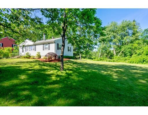 97 Meadowbrook Road Chelmsford, MA 01863 - Photo 2 of 15 a backyard of a house with table and chairs