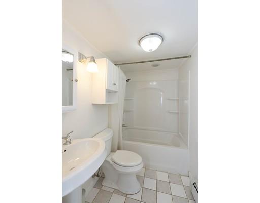 97 Meadowbrook Road Chelmsford, MA 01863 - Photo 10 of 15 a bathroom with a granite countertop toilet sink and shower
