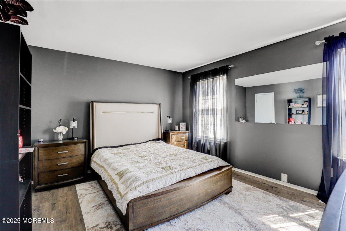 111 Joan Court Jackson, NJ 08527 - Photo 13 of 22 a bedroom with a double bed and a dresser