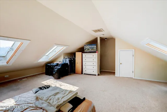 a view of livingroom with furniture and stairs