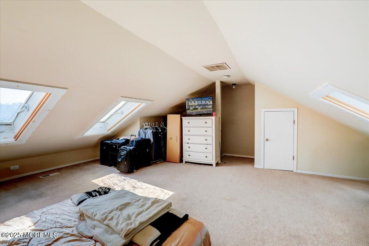 111 Joan Court Jackson, NJ 08527 - Photo 15 of 22 a view of livingroom with furniture and stairs