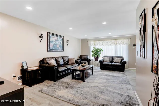 a living room with furniture and a couch