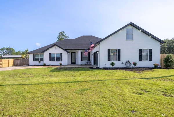 $875,000 | 221 White Oaks Boulevard, Southport, FL 32409