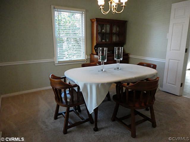 7349 Drexelbrook Road Chesterfield, VA 23832 - Photo 11 of 24 a view of a dining room with furniture and window