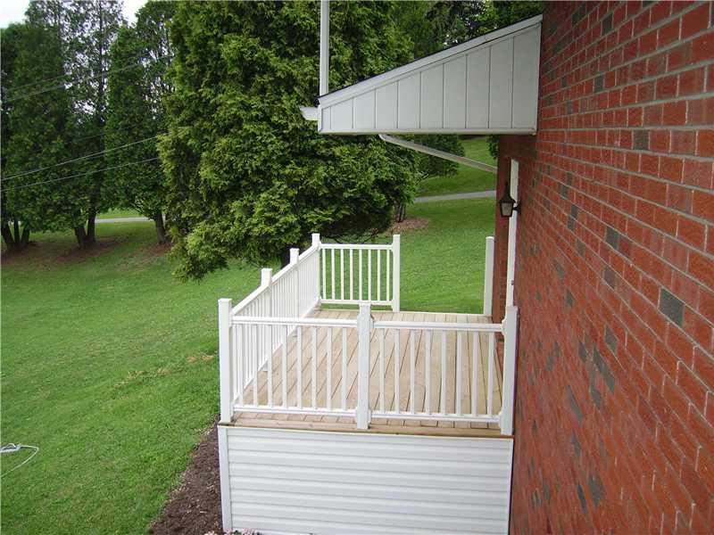 1047 Temple Road Aliquippa, PA 15001 - Photo 19 of 22 Patio/Deck. Deck off living room.