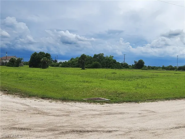 a view of a golf course with a garden