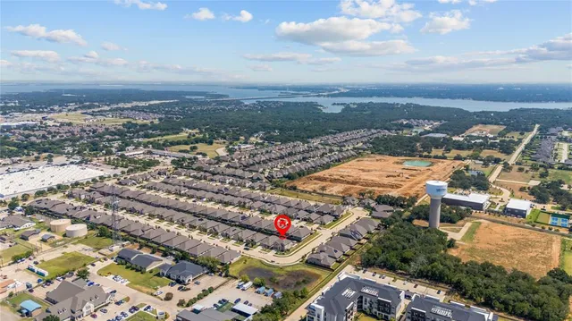 an aerial view of city and ocean