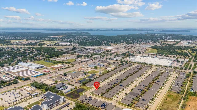 an aerial view of residential building and city