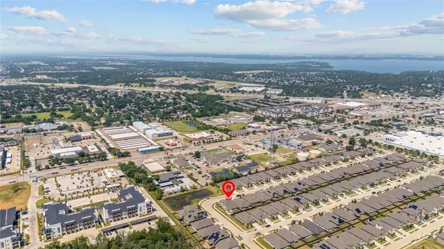 an aerial view of residential building and city view