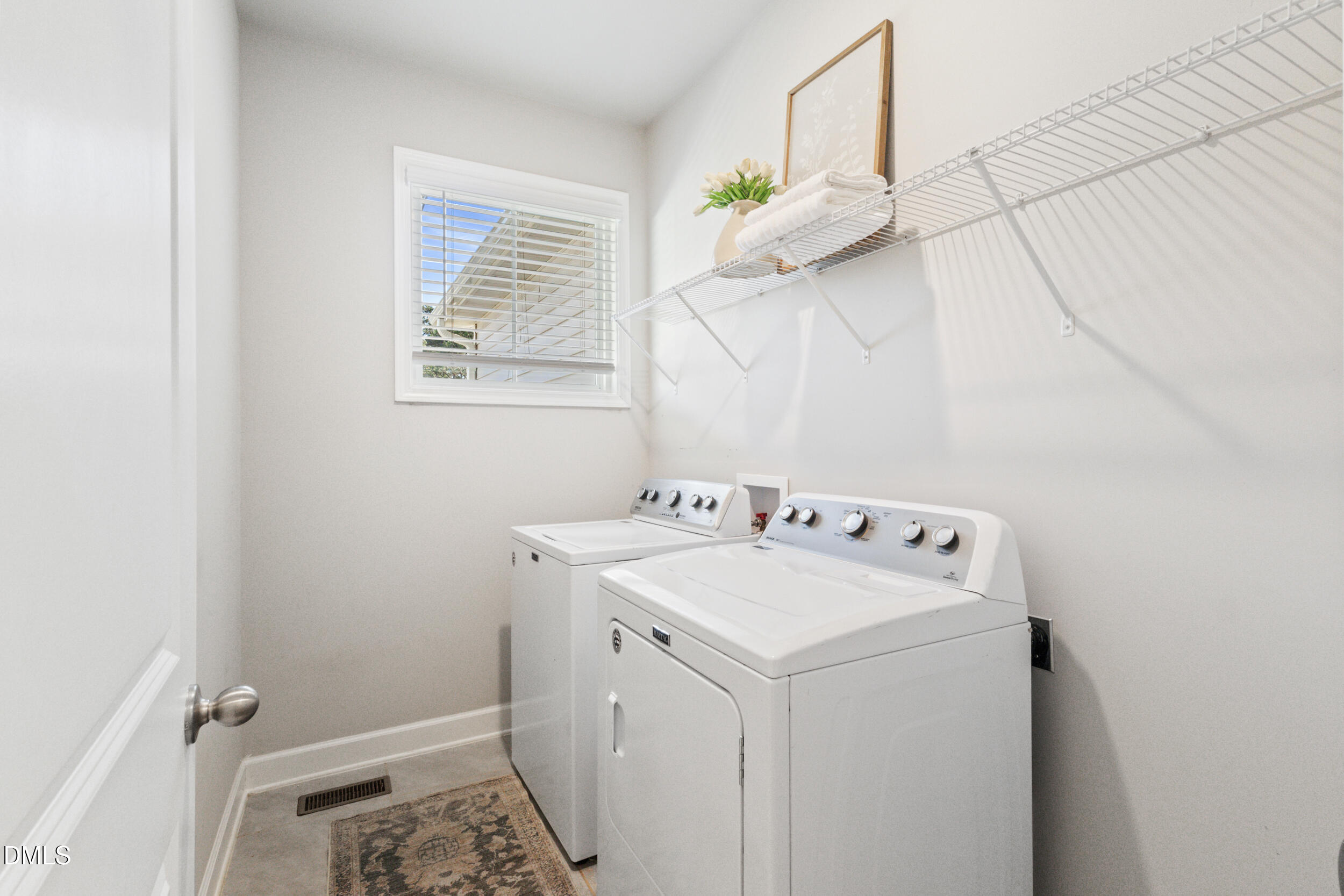 1024 JARRETT BAY Road Willow Spring, NC 27592 - Photo 22 of 43 a utility room with dryer and washer