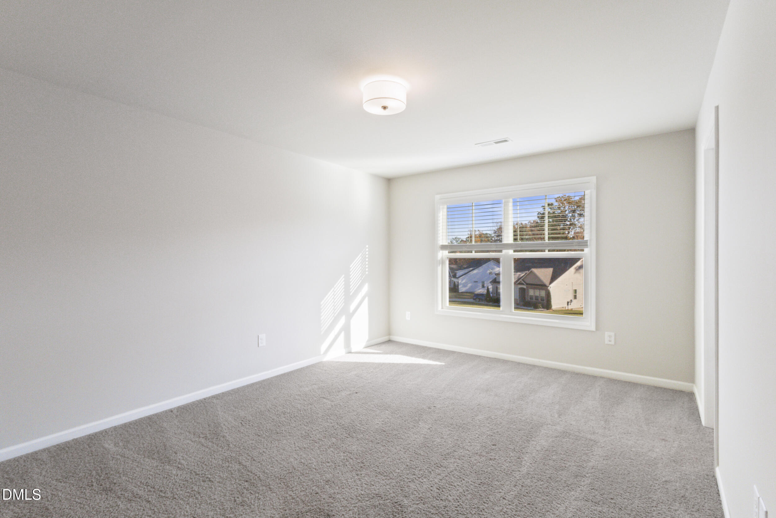 1024 JARRETT BAY Road Willow Spring, NC 27592 - Photo 27 of 43 a view of an empty room with a window